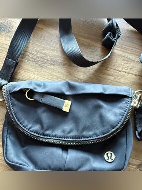 lululemon athletica Black Crossbody Bag with Gold Accents